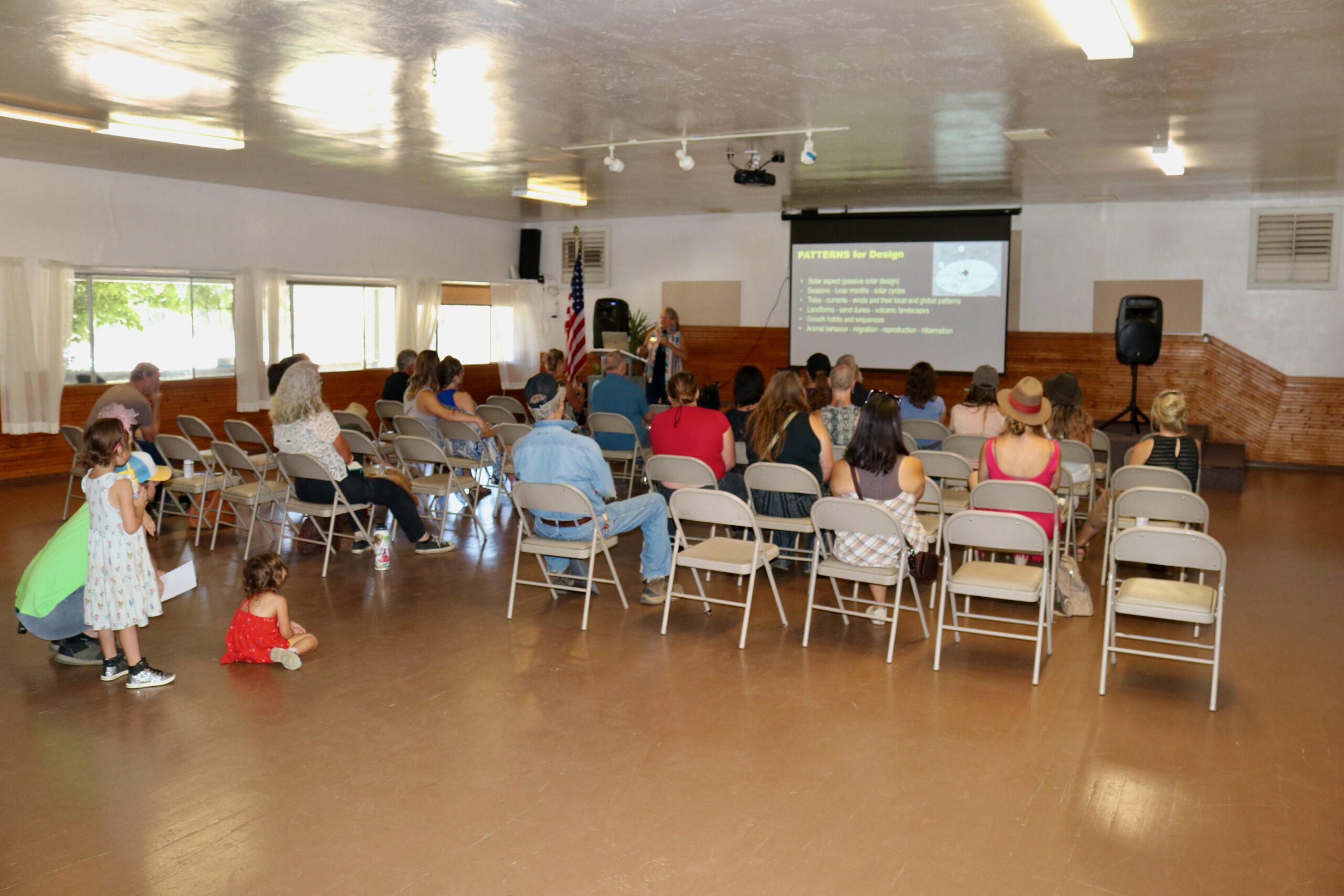 Community members attending a speaker presentation during the NUKU Land and Infrastructure Expo